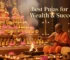 Wealth and success puja with offerings of gold, flowers, and fire ritual at ancient temple